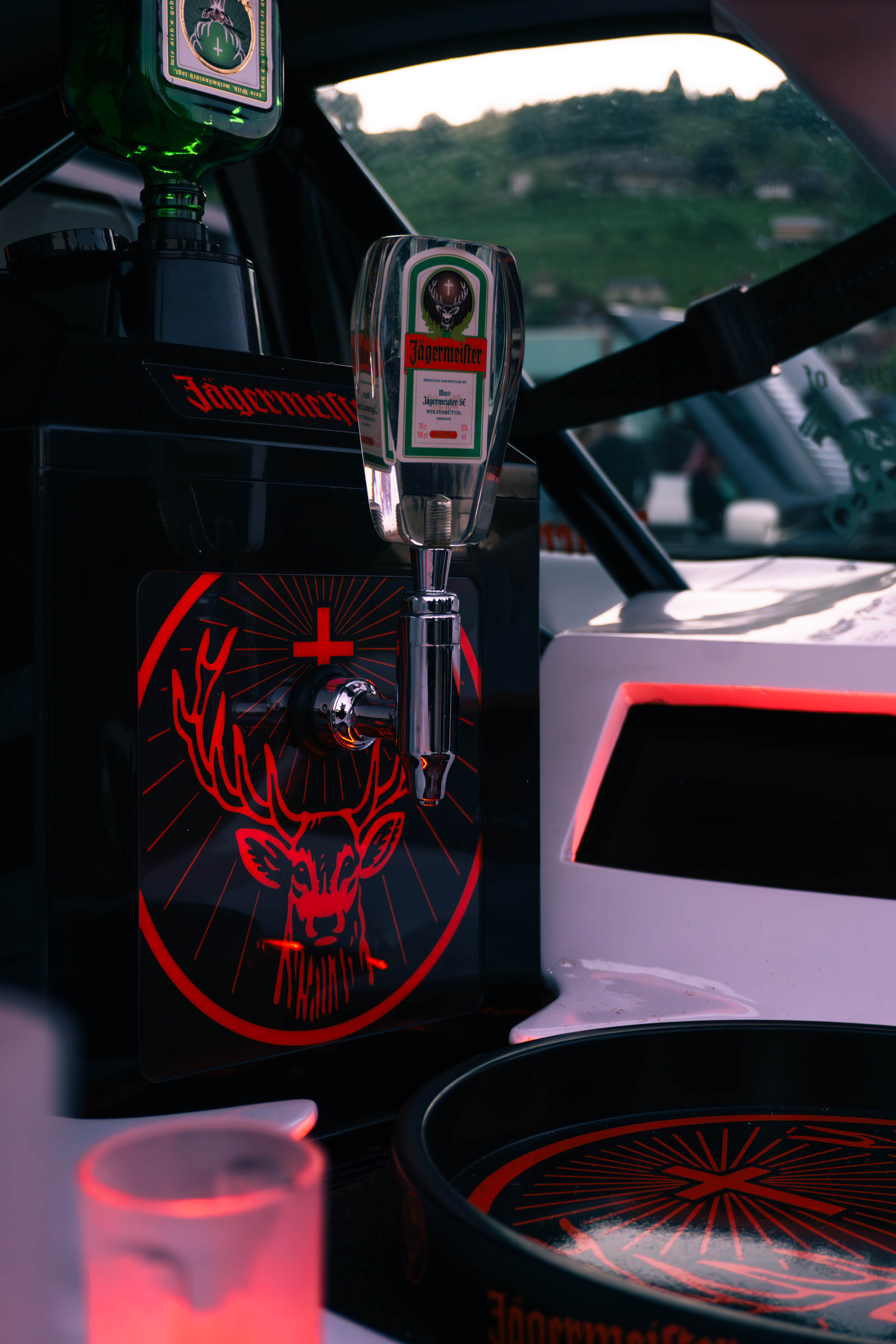 Peuegeot with a Jägermeister in the Trunk